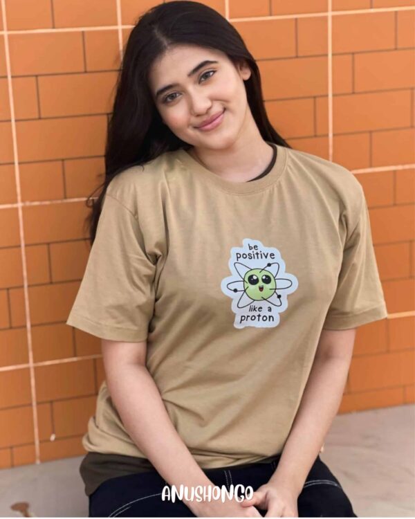 Be Positive Like A Proton- Unisex -T-Shirt